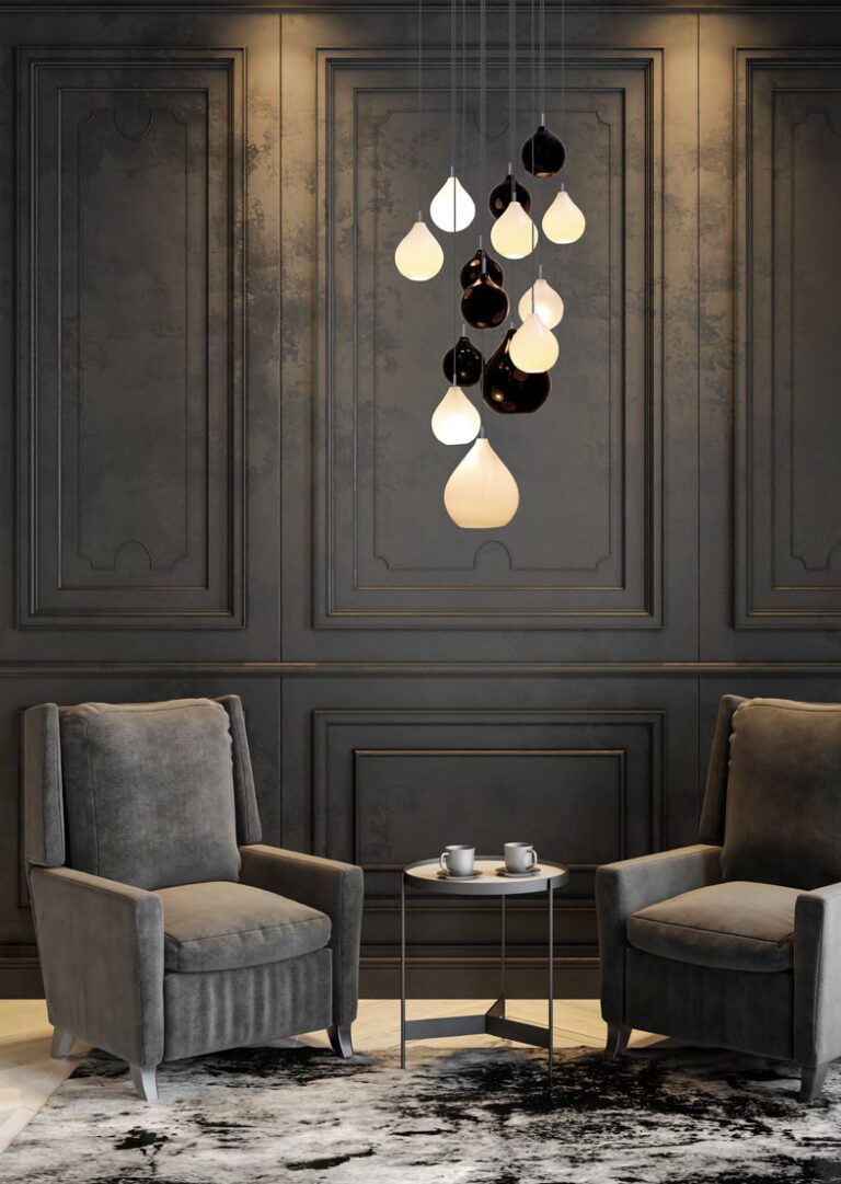 Cascade de lumière Découvrez l’élégance raffinée de cette cascade de lumière Concept Verre ,composée de 14 verres soufflés à la bouche, disposés en cascade pour créer un chef-d’œuvre lumineux. Chaque verre, noir et blanc offre un effet envoûtant même éteint, ajoutant une touche de sophistication à votre intérieur. Les verres, de tailles variées, sont minutieusement sélectionnés pour un rendu harmonieux et artistique. Equipée d’ampoules G9, cette suspension garantit un éclairage chaleureux et accueillant. Les câbles transparents assurent une discrétion parfaite, mettant en avant la beauté des verres. Le pavillon rond chromé de 60 cm de diamètre apporte une finition moderne et luxueuse, tandis que les câbles de 2 mètres offrent une grande flexibilité d’installation. Besoin de plus de longueur ? Nous offrons la possibilité d’allonger les câbles sur demande pour s’adapter parfaitement à votre espace. N’hésitez pas à nous contacter pour adapter le luminaire à vos besoins.https://equinoxluminaires.com/contact/