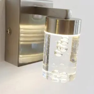 Applique murale salle de bain en verre bulle et socle metal chrome.