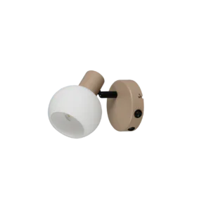 Gros plan sur la rotule orientable et l'interrupteur du spot beige.
