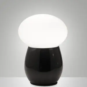 Lampe a poser champignon avec pied noir brillant et dome en verre opalin blanc.
